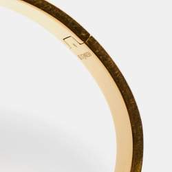 Pre Owned Hermes Clic H Black Enamel Gold Tone Metal Bracelet PM