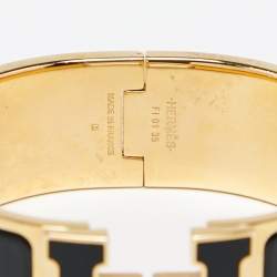 Pre Owned Hermes Clic H Black Enamel Gold Tone Metal Bracelet