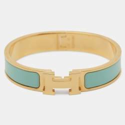 Pre Owned Hermès Clic H Blue Enamel Gold Tone Metal Narrow Bracelet