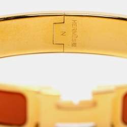 Pre Owned Hermès Clic H Orange Enamel Gold Plated Narrow Bracelet