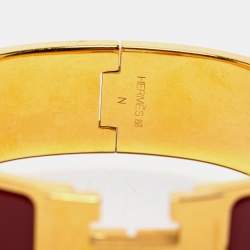 Pre Owned Hermès Clic Clac H Burgundy Enamel Gold Plated Wide Bracelet