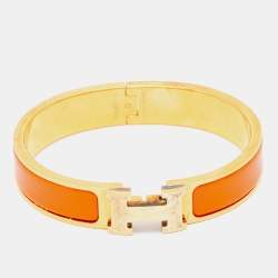 Pre Owned Hermès Clic H Orange Enamel Gold Plated Narrow Bracelet