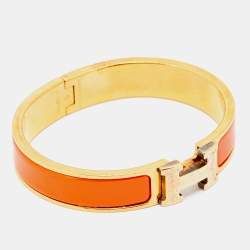 Pre Owned Hermès Clic H Orange Enamel Gold Plated Narrow Bracelet