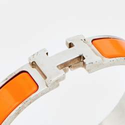 Pre Owned Hermes Clic H Orange Enamel Palladium Plated Narrow Bracelet