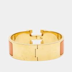 Pre Owned Hermès Clic Clac H Orange Enamel Gold Plated Wide Bracelet 