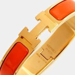 Pre Owned Hermes Clic H Orange Enamel Gold Plated Bracelet