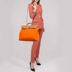 Pre Owned Hermes Orange/Natural Toile and Vache Hunter Leather Herbag Zip 39 Bag