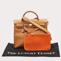 Pre Owned Hermes Dune/Naturel Sable/Orange Toile H and Vache Hunter Herbag Zip 31 Bag