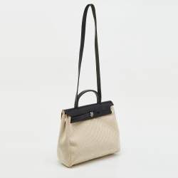 مملوكة مسبقًا حقيبة هيرمس هيرباغ فاشي هنتر قماش تويل موكا/أحمر طوبي 31