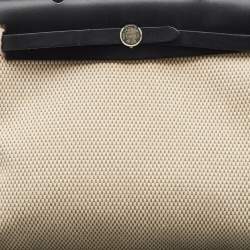 مملوكة مسبقًا حقيبة هيرمس هيرباغ فاشي هنتر قماش تويل موكا/أحمر طوبي 31