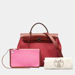 مملوكة مسبقًا حقيبة هيرمس هيرباج توال روبيرسو وسور ٣١ بألوان وردي وأحمر