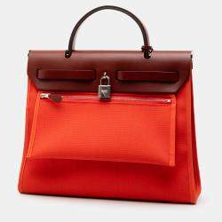 مملوكة مسبقًا Hermes Orange Red Toile Herbag Zip 31