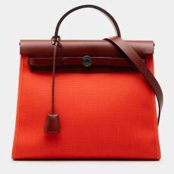 مملوكة مسبقًا Hermes Orange Red Toile Herbag Zip 31