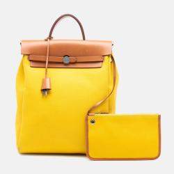 Pre Owned حقيبة ظهر هيرمس هرباج عودة بسحاب صفراء وبنية قماش Toile