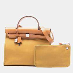 مملوكة مسبقًا Hermes Brown Yellow Toile Herbag Zip 31