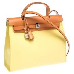 Pre Owned Hermes Natural/Soufre Canvas and Leather Herbag Zip 31 Bag