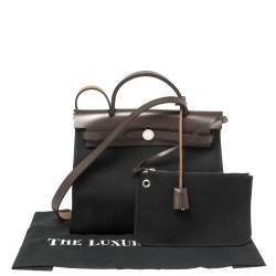 Pre Owned Hermès Black Canvas And Brown Leather Herbag Zip 31 Bag
