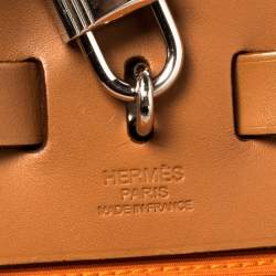 Pre Owned Hermes Orange/Natural Canvas and Leather Herbag Zip 31 Bag