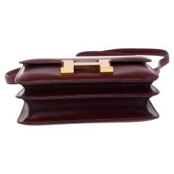Pre Owned Hermés Rouge H Veau Monsieur Leather Gold Plated Constance 18 Bag