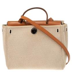Pre Owned Hermes Noir/Natural Canvas and Leather Herbag PM Bag