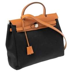 Pre Owned Hermes Noir/Natural Canvas and Leather Herbag PM Bag