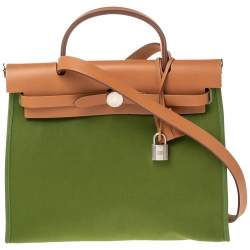 Buy designer Top Handle Bags by hermes at The Luxury Closet.