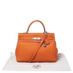 Pre Owned Hermes Orange Togo Leather Palladium Hardware Kelly Retourne 35 Bag