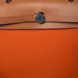 مملوكة مسبقًا Hermes Orange/Natural Canvas and Leather Herbag Zip PM Bag