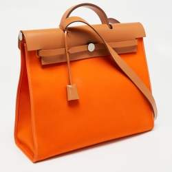 Pre Owned Hermés Orange/Natural Canvas and Leather Herbag Zip 39 Bag