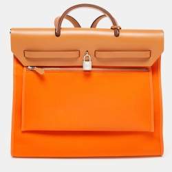 Pre Owned Hermés Orange/Natural Canvas and Leather Herbag Zip 39 Bag