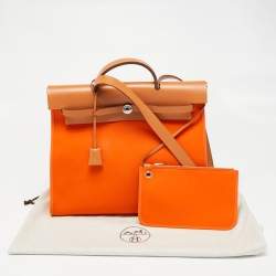 Pre Owned Hermés Orange/Natural Canvas and Leather Herbag Zip 39 Bag