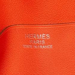 Pre Owned Hermes Orange Poppy Clemence and Swift Leather Virevolte Clutch
