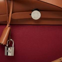 Pre Owned Hermes Ruby/Fauve Canvas and Leather Herbag Zip 31 Bag