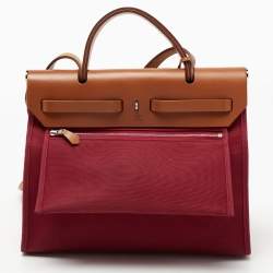Pre Owned Hermes Ruby/Fauve Canvas and Leather Herbag Zip 31 Bag