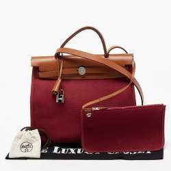 Pre Owned Hermes Ruby/Fauve Canvas and Leather Herbag Zip 31 Bag