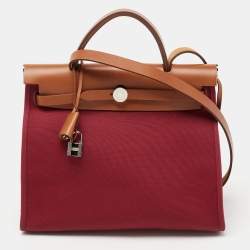 Pre Owned Hermes Ruby/Fauve Canvas and Leather Herbag Zip 31 Bag