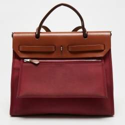 Pre Owned Hermes Ruby/Fauve Canvas and Leather Herbag Zip 31 Bag