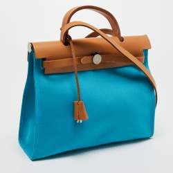 Pre Owned Hermes Celeste/Natural Canvas and Leather Herbag Zip 31 Bag
