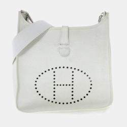 HERMES. Evelyne bag in fawn-colored hard leather. White …