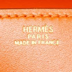 Pre Owned Hermes Orange Tadelakt Leather Medor 23 Clutch