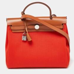Pre Owned Hermes Orange/Fauve Canvas and Leather Herbag Zip 31 Bag