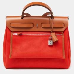 Pre Owned Hermes Orange/Fauve Canvas and Leather Herbag Zip 31 Bag