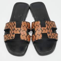 مملوكة مسبقًا Hermès Black/Brown Printed Leather Oran Flat Slides Size 41
