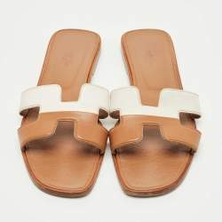 Pre Owned Hermes Brown/White Leather Oran Flat Slide Sandals Size 41