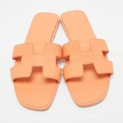 Pre Owned Hermes Orange Leather Oran Flat Slides Size 37.5