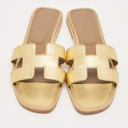 Pre Owned حذاء سلايد مسطح هيرمس أوران جلد ذهبي مقاس 42