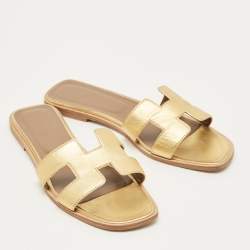 Pre Owned حذاء سلايد مسطح هيرمس أوران جلد ذهبي مقاس 42