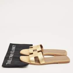 Pre Owned حذاء سلايد مسطح هيرمس أوران جلد ذهبي مقاس 42