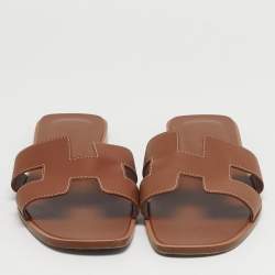 Pre Owned صندل سلايد هيرمس أوران فلات جلد أبيض مقاس 39