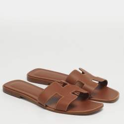 Pre Owned صندل سلايد هيرمس أوران فلات جلد أبيض مقاس 39